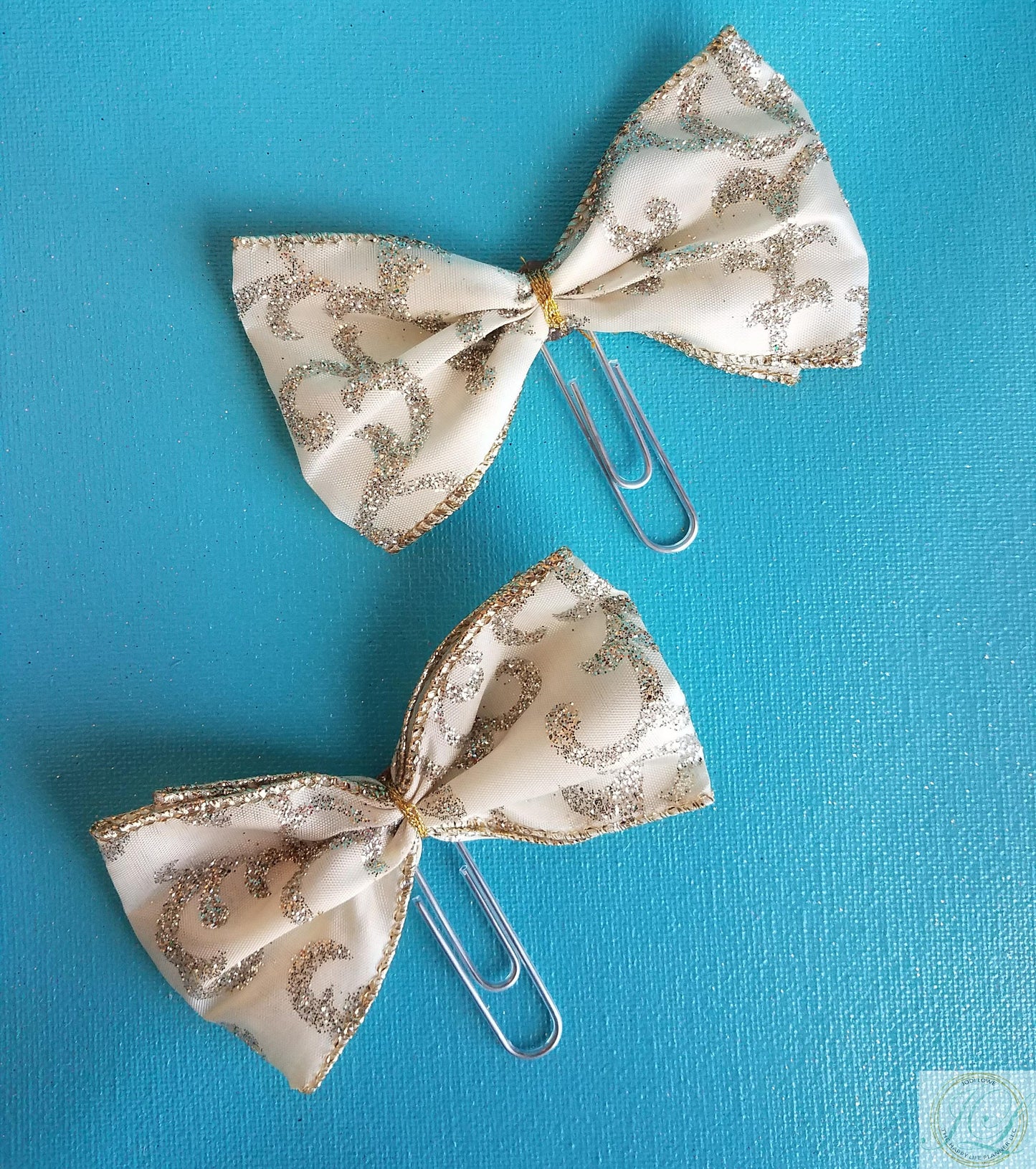 Ivory silver scroll planner clip bow