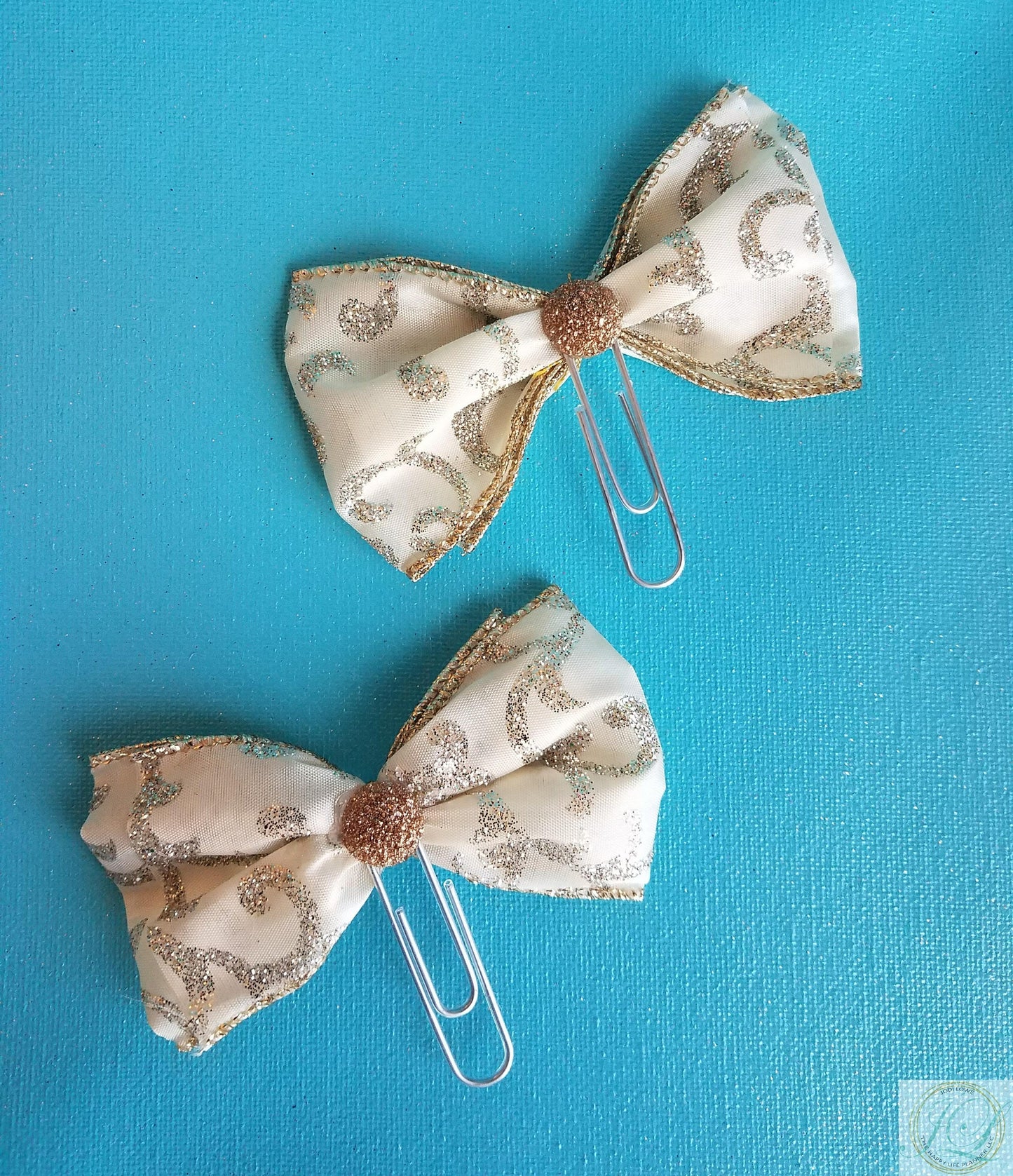 Ivory silver scroll planner clip bow